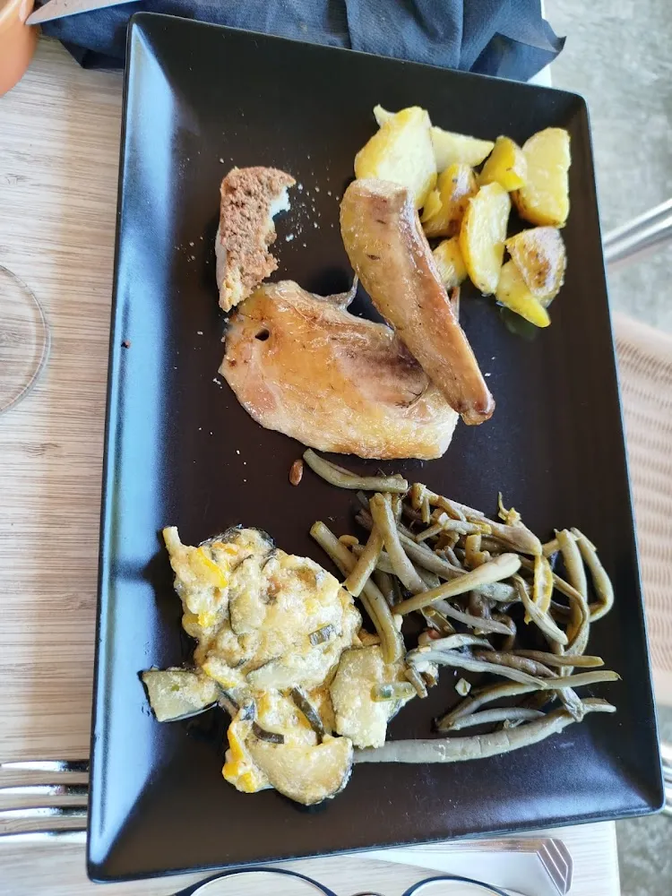 Pintade Rôtie Au Feu de Bois